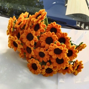 Handcrafted plush sunflower bouquet display on car hood for creative gifts