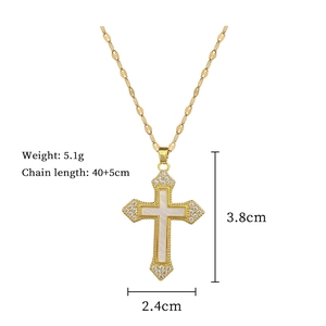 Detailed size specifications for gold cross necklace with shell inlay and crystal pavé