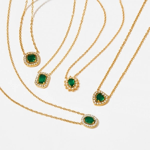 Gold titanium steel necklaces with emerald green gemstone pendants in various shapes