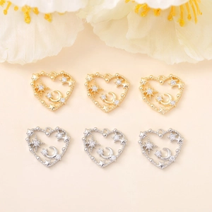 Star and moon engraved heart pendants with cubic zirconia in gold and silver finish