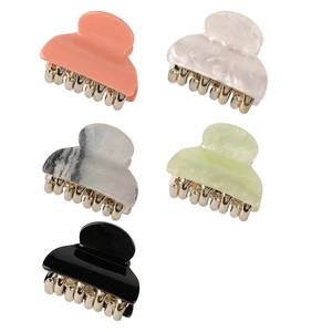 Five-piece set of mini acrylic hair claws in assorted colors with gold metal teeth