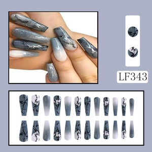 Detail view of model hands wearing long marble, grey and glitter press-on nails LF343