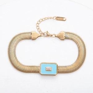 Detail of 18k gold plated snake chain with sky blue enamel pendant and clear zircon stone