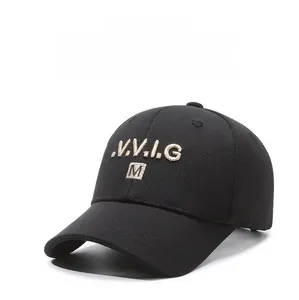 Detail shot of black baseball cap with golden V.V.I.G embroidery and premium texture