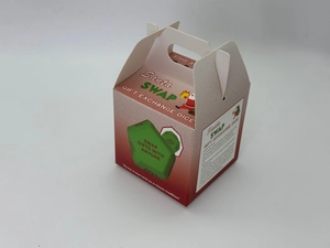Detail showing the Santa Swap gift box with interactive rules and a large green dice