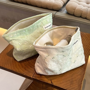 Large capacity canvas makeup bags in green and cream with swirl textured fabric