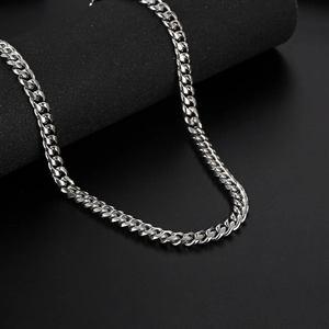 Silver stainless steel Cuban link necklace for men with a punk style aesthetic