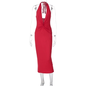 Detail of red deep V-neck halter midi dress with stylish waist knot and draping fabric
