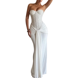 Elegant white strapless evening gown with sequin bodice and draped floor-length skirt