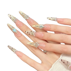 Pink leopard press-on nails with luxury pearls, sparkling rhinestones and gradient finish