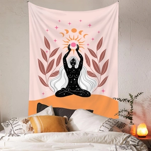 Detail of bohemian tapestry featuring a celestial goddess silhouette with sun and moon motifs