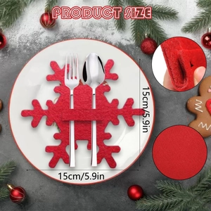 Detail of red snowflake cutlery holder on white plate with 15cm size measurement
