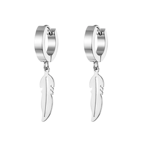 Macro detail of silver feather pendants on stainless steel hoop earrings with polished finish