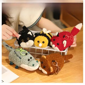 Close-up of cute plush animal keychains in various designs with soft textured fabric