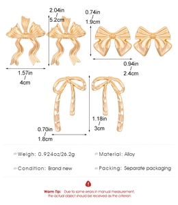 Detailed size and weight specs for vintage red bow earrings in gold-tone alloy