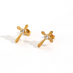 Detailed view of 18k gold plated stainless steel cross earrings with round zircon