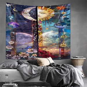 Detailed view of sun and moon tapestry hanging on a grey wall in a cozy bedroom