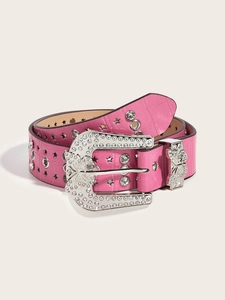 Detail of pink croc-embossed leather belt with silver butterfly buckle and star studs