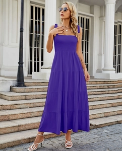 Detail of purple backless sundress with smocked bodice and tiered ruffle skirt