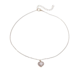 Elegant gold heart pendant necklace with cat-eye stone and crystal border for women
