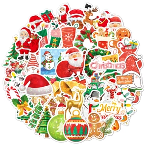 Close-up of waterproof holographic laser Christmas stickers with Santa and reindeer motifs