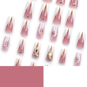 French tip press-on nails with golden glitter, white flowers and rhinestones