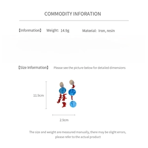 Detailed spec infographic showing 14.9g weight and 11.9cm length for tassel earrings