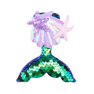 Sparkly mermaid tail hair clip for girls with sequins and decorative seashells