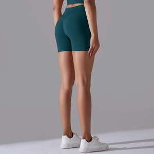 Détail du short de yoga sans couture taille haute avec effet liftant en bleu canard