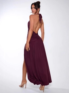 Elegant deep purple halter maxi dress with backless design and pleated details