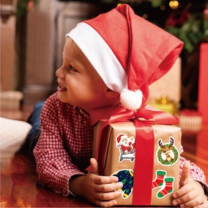 Holographic Christmas stickers featuring Santa and reindeer on festive gift boxes