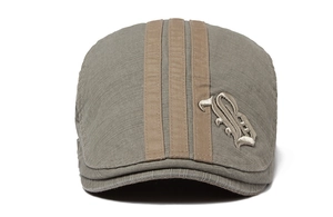 Detailed view of grey cotton flat cap featuring khaki stripes and letter B embroidery