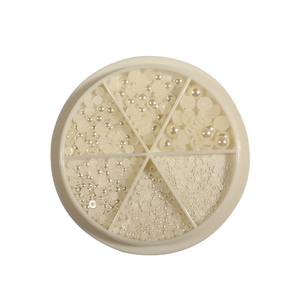 Mix of white faux pearls in a 6-grid carousel wheel for nail art and DIY jewelry making