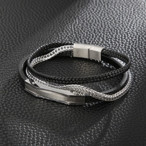 Close-up of multilayer leather bracelet with silver chain and magnetic metal clasp