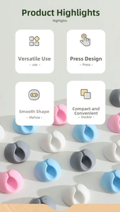 Macro view of round silicone cable organizers in pastel colors with press-fit design