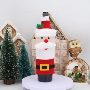 Knitted Santa Claus wine bottle cover for Christmas table decor and festive gift packaging