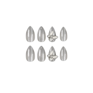 Faux ongles Cat Eye argentés avec papillon métallique 3D et strass, style amande