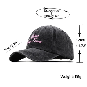 Vintage black washed cotton baseball cap with pink embroidery and size specifications