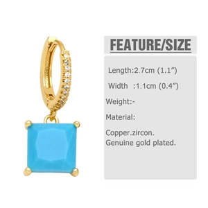Detail showing 2.7cm length gold plated copper earrings with blue square zircon