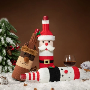 Knitted Christmas wine bottle covers featuring Santa, reindeer, and snowman designs