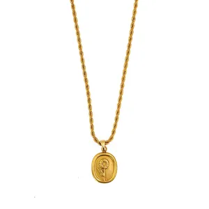 Golden twist chain necklace featuring an oval sunflower relief pendant in retro style