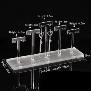 Acrylic 5-piece T-bar earring display stand with tiered heights and clear rectangular base