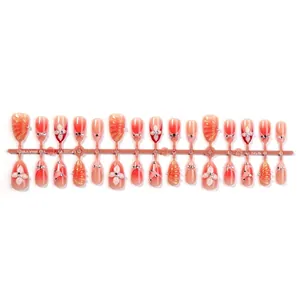 3D floral press-on nails with pink gradient, pearls and rhinestones on long almond tips
