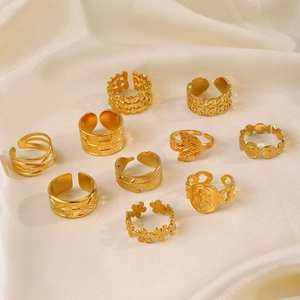 10-piece gold stainless steel ring set with vintage relief and geometric designs