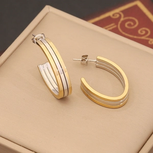Three-layer geometric mixed metal stud earrings in gold and silver stainless steel