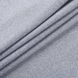 Makro-Detail von hochwertigem grauem Strickstoff mit weicher Faserstruktur und Webdichte