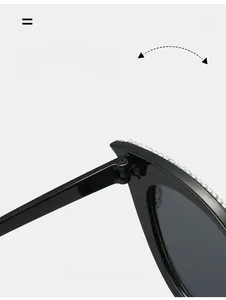 Detail of durable texture hinge and sparkling crystals on black cat-eye sunglasses