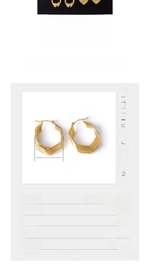 Detail view of 2.5cm gold titanium steel geometric layered earrings with size dimensions