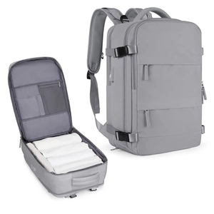 Detailed interior compartment and side view of a grey large-capacity travel backpack