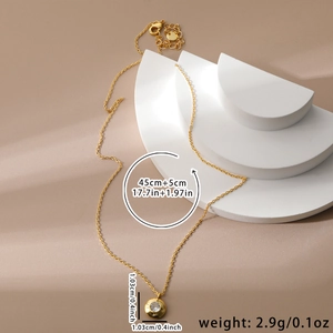 Detailed size chart for the gold zircon pendant necklace on a geometric display stand